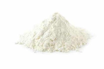 Heap of wheat flour isolated on white